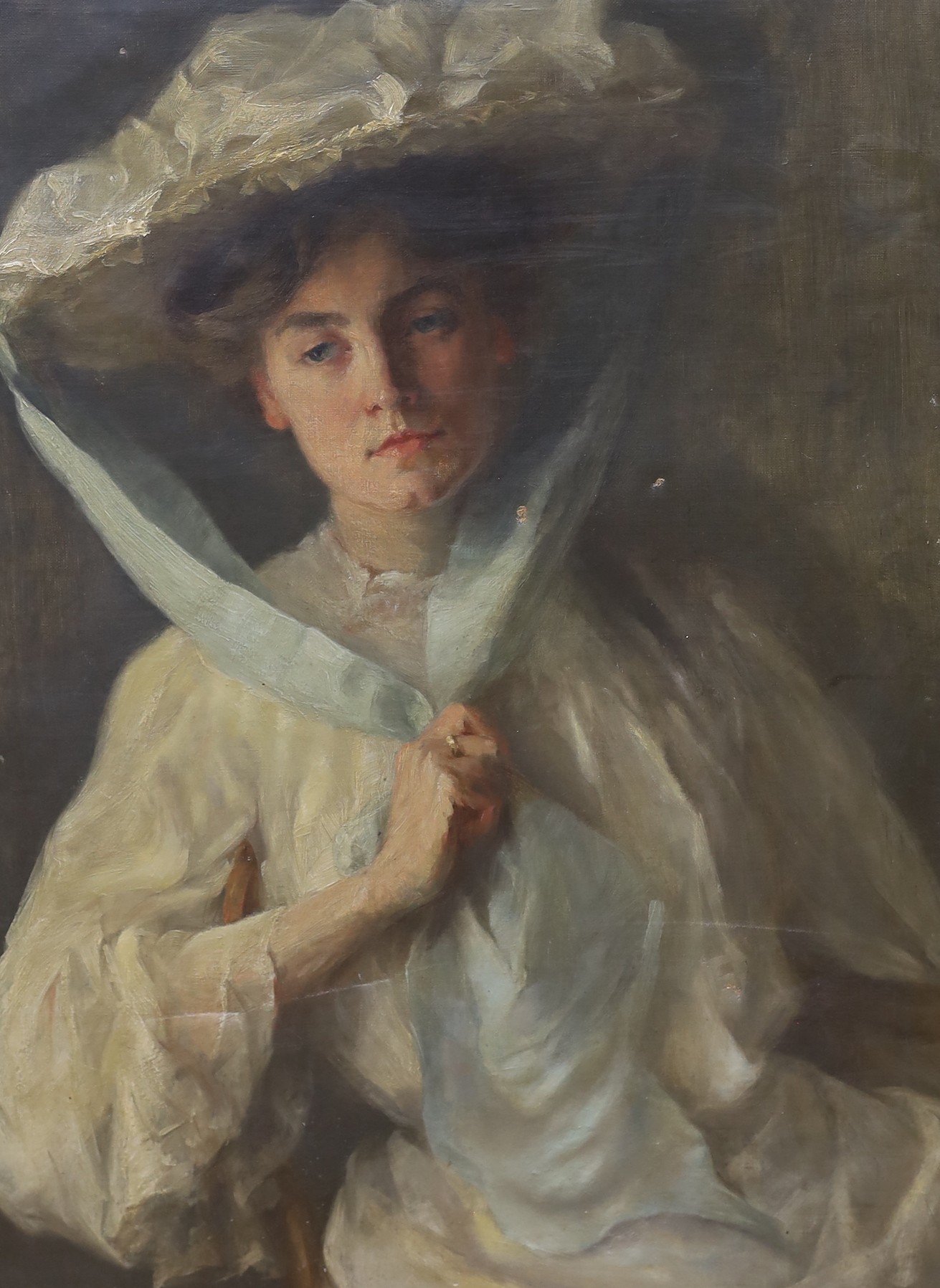 English School c.1910, oil on canvas, Portrait of a lady wearing a white bonnet, 69 x 51cm, unframed